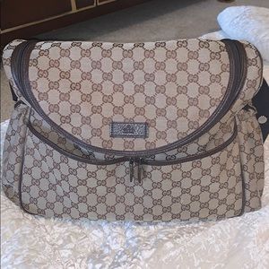 Gucci canvas diaper bag without changing pad.